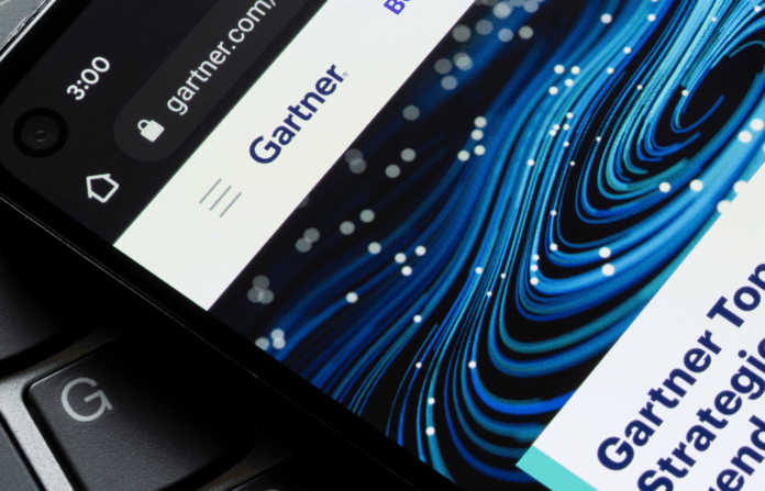 Website homepage of Gartner, Inc seen on a mobile phone display.